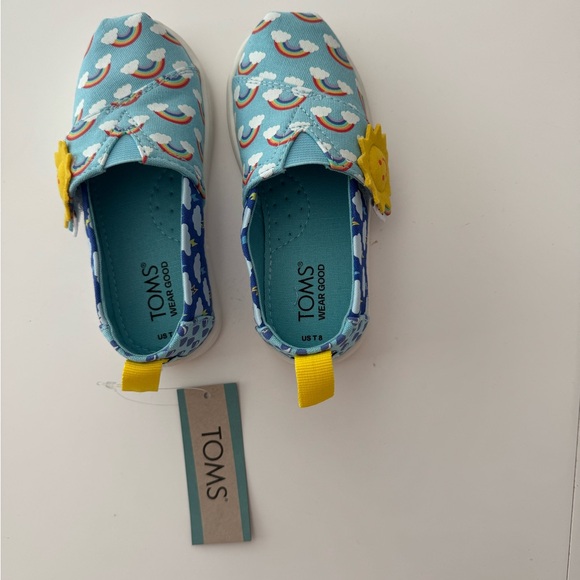 TOMS Kids Light Blue Moccasins with Rainbow Pattern - Picture 1 of 3